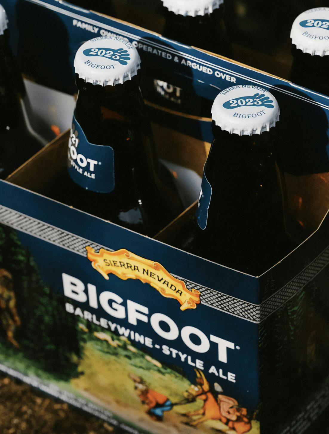 A closeup shot of Bigfoot bottle caps inside a 6-pack