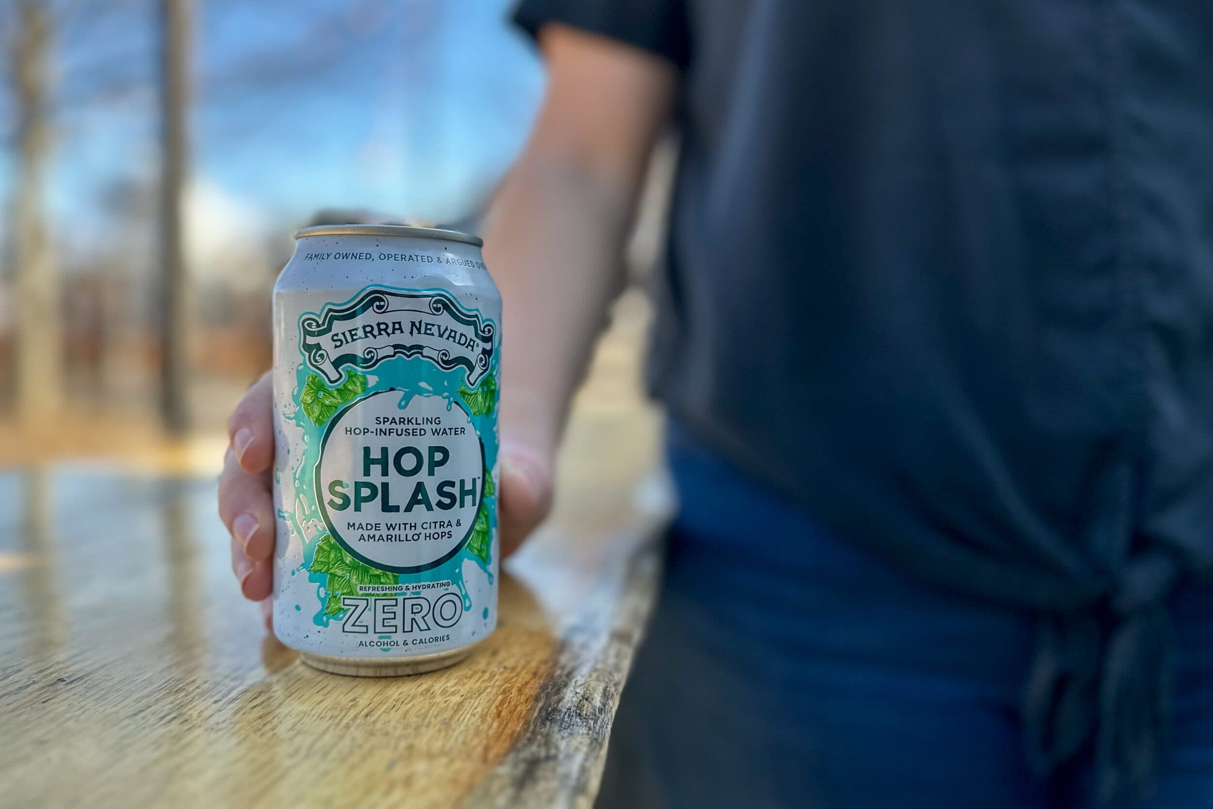 Hop Splash can held by person outside