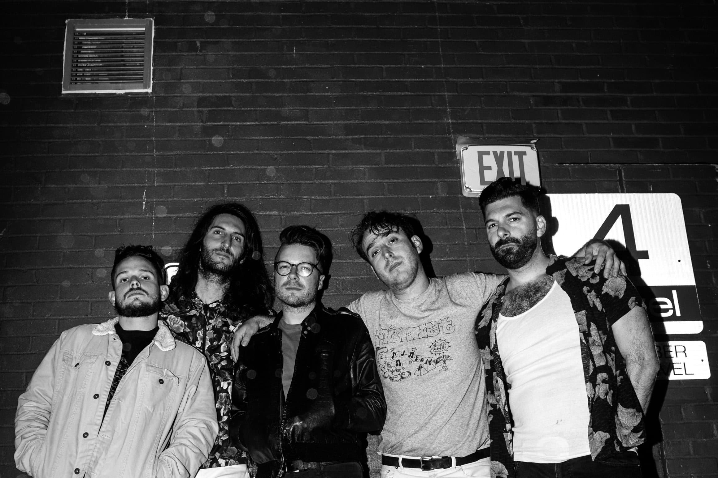 Magic City Hippies band posing for a photo
