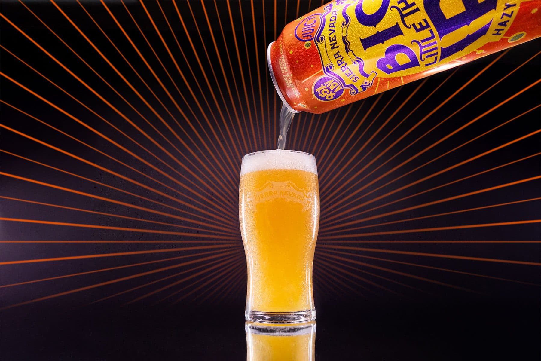 Pouring a can of Sierra Nevada Big Little Thing Hazy Imperial IPA into a pint glass