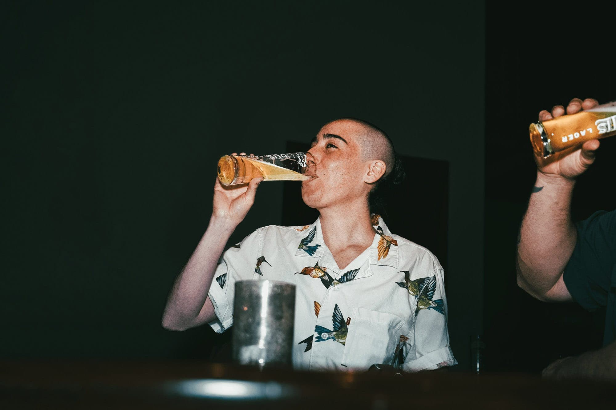 Someone drinking a glass of Sierra Nevada PILS
