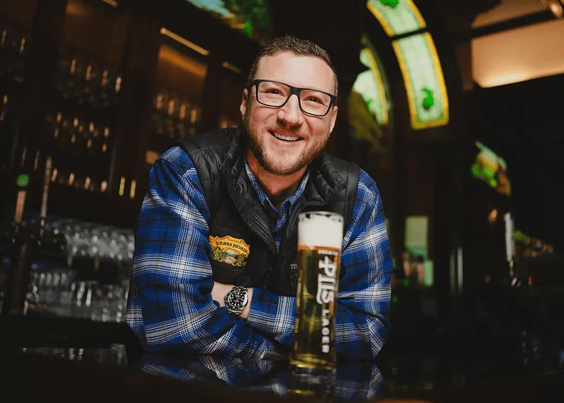 Brian Grossman with glass of Sierra Nevada PILS
