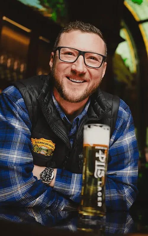 Brian Grossman with glass of Sierra Nevada PILS