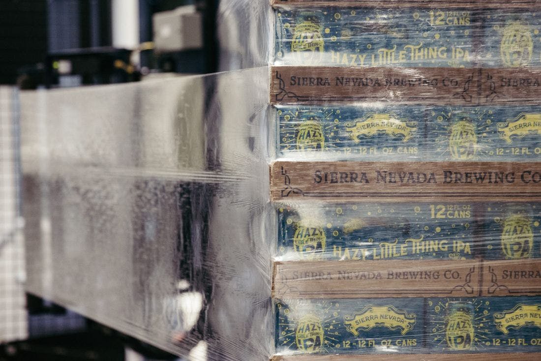 a shrink wrapped beer pallet