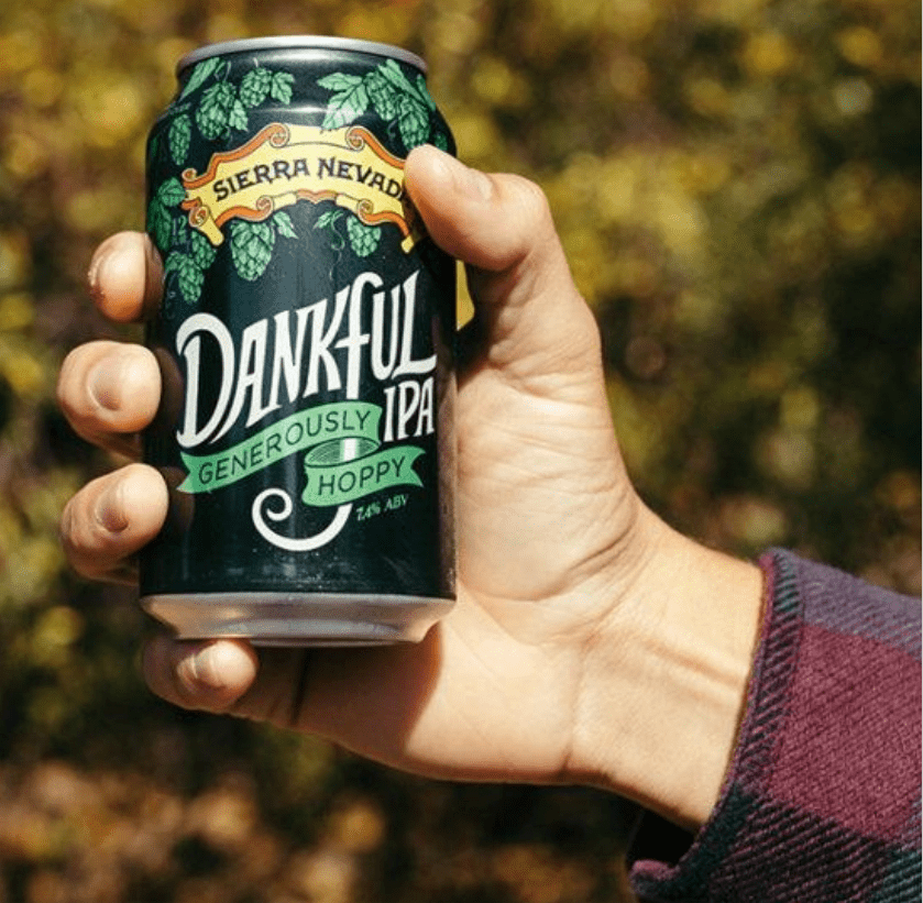 Hand holding Dankful IPA beer can