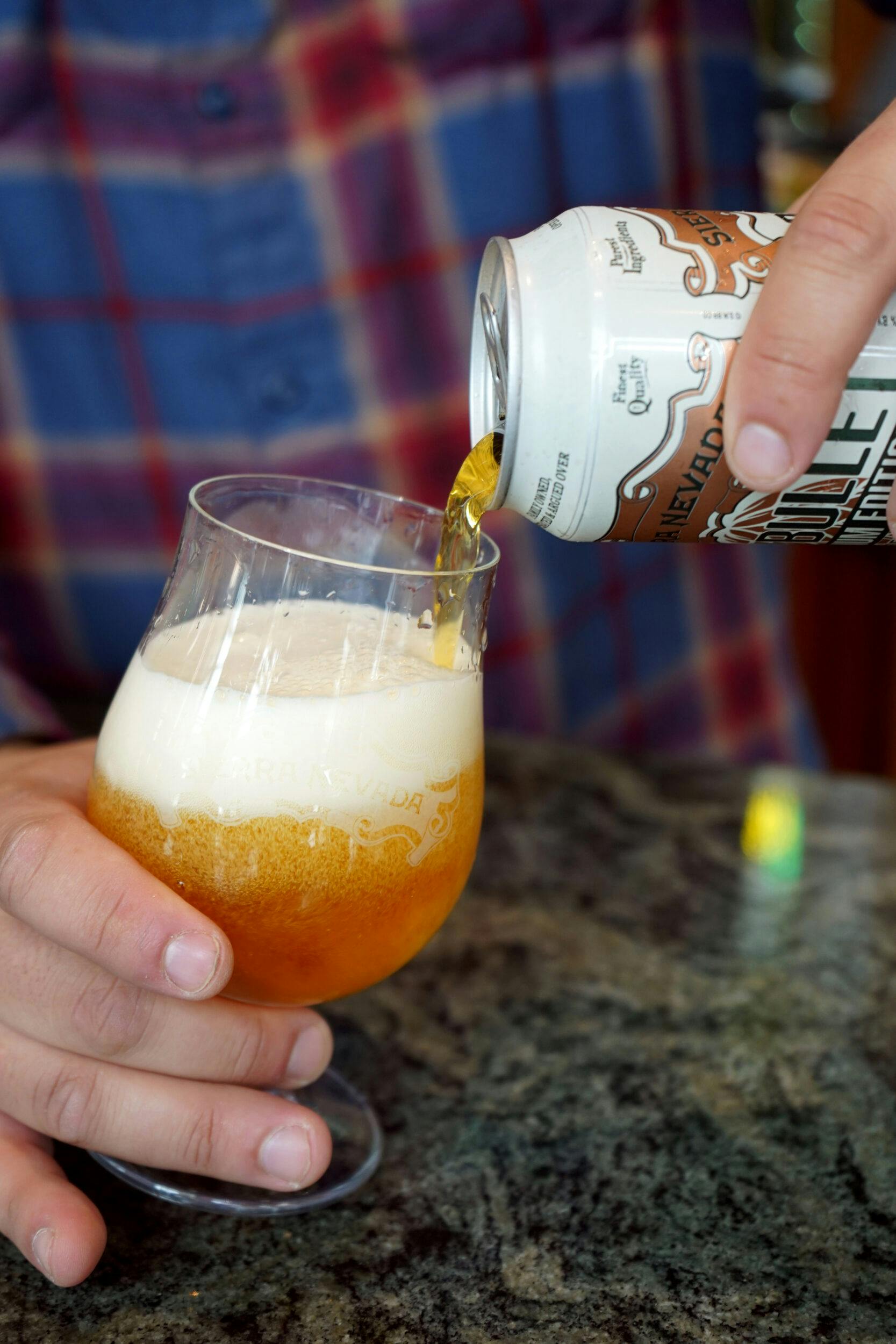 Hop Bullet Magnum can pouring into glass